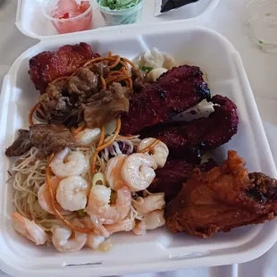 Fried chicken, won ton, beefy BBQ chicken wings, thin noodles with shrimp.