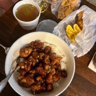 Orange Chicken Dinner Combo with Wonton Soup, egg rolls and crab Rangoons.