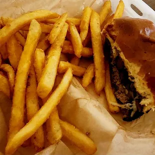 French fries and a mushroom Swiss burger.
