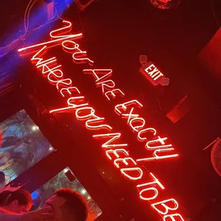 a neon sign for a bar