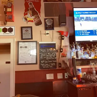 a bar with a large screen tv