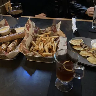 Pretzel sticks, fries, pierogi