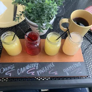 Mini (4 oz) mimosa flight.  Grapefruit was my pick as far as flavor goes. Other juices weren&apos;t top shelf juices at all.