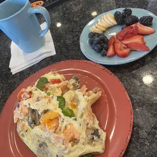 Skinny omelet with salmon and a fruit plate. Yum!