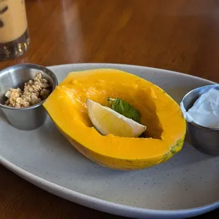 Fresh Papaya with Granola and Yogurt sides