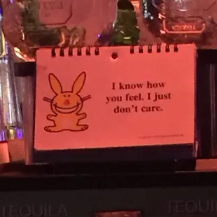 a notepad with a picture of a rabbit on it