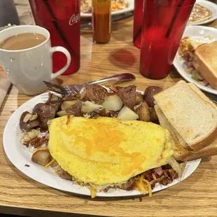Meat Lovers omelette with country potatoes