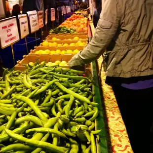 a woman shopping for vegetables