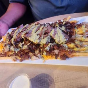 Dirty fries with a whole steak on top!