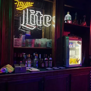 the bar with neon signs
