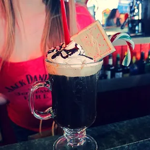 a woman with a drink