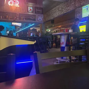 a bar with a neon sign