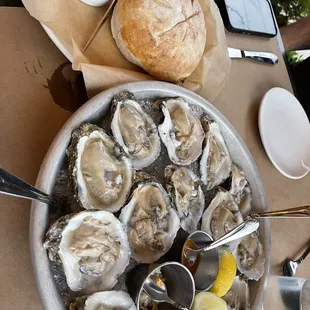 Happy Hour $2 oysters and sourdough bread $7