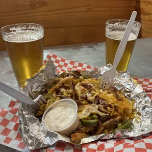 Loaded fries and cold beer