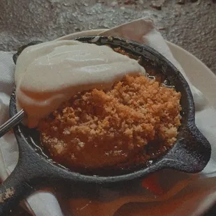 Peach cobbler with handmade whip cream