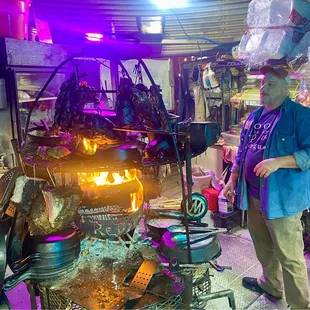 James shows off his inside fire pit.