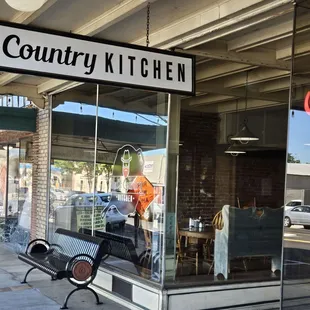 Toward the entry door. There's a kid play area in one section in front... great idea for families