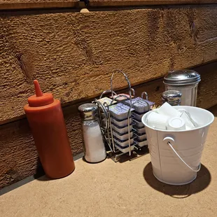 Condiments and creamer at each table