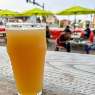 a glass of beer on a table