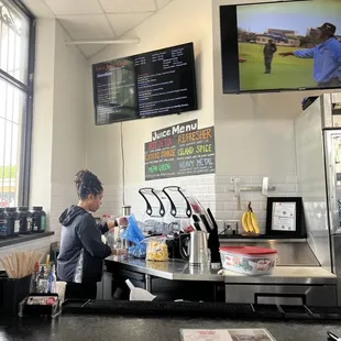 a woman sitting at the counter