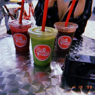 three drinks on a table