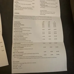 a menu and a receipt on a table