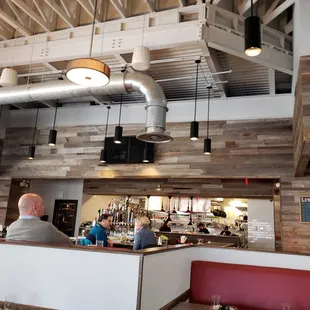 indoor seating with bar in the background.