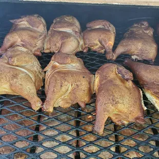roasting chicken on a grill