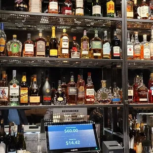 a woman behind the bar