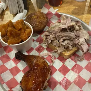 Chicken, pulled pork, candied yams and cornbread muffin