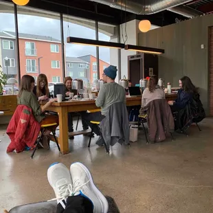 a group of people sitting at a table