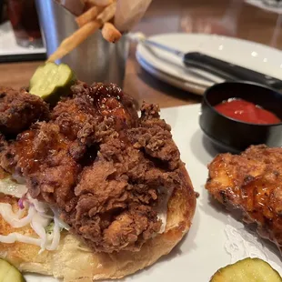 a fried chicken sandwich and pickles