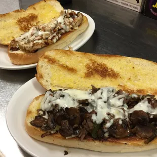 two sub sandwiches on plates