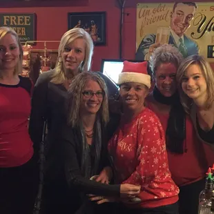 a group of women posing for a picture