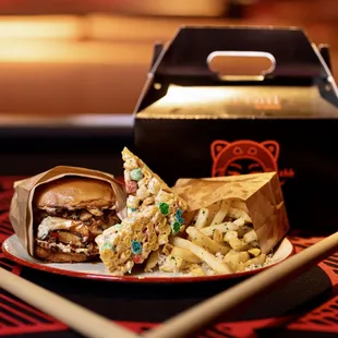 a plate of food and chopsticks
