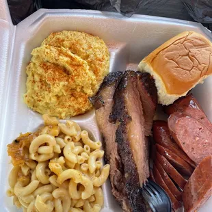 2 meat plate with Jalapeño Sausage and Brisket. Mac and cheese and potato salad