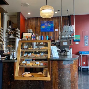 a counter with a variety of pastries