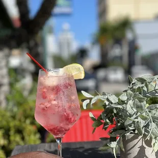 a person holding a drink