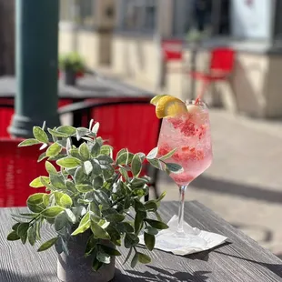a pink drink on a table