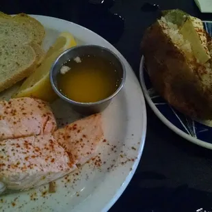 Salmon dinner with two baked potatoes