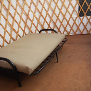 bed inside yurt