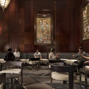 a group of people sitting at tables