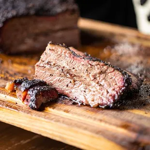 a piece of beef on a cutting board
