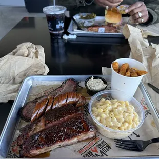 Brisket, ribs, sausage, white cheddar Mac and fries