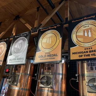 a row of beer tanks