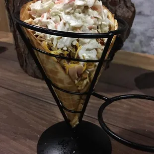 a large cone of food on a table