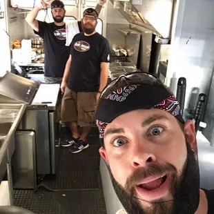 two men in a restaurant kitchen