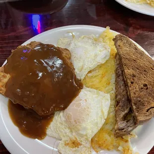 Chicken fried steak and eggs (brown gravy requested)