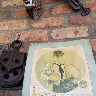 a poster of a man with a hat and tie