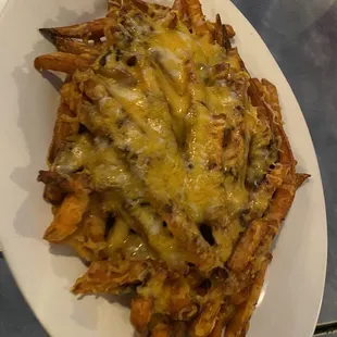 a plate of loaded fries